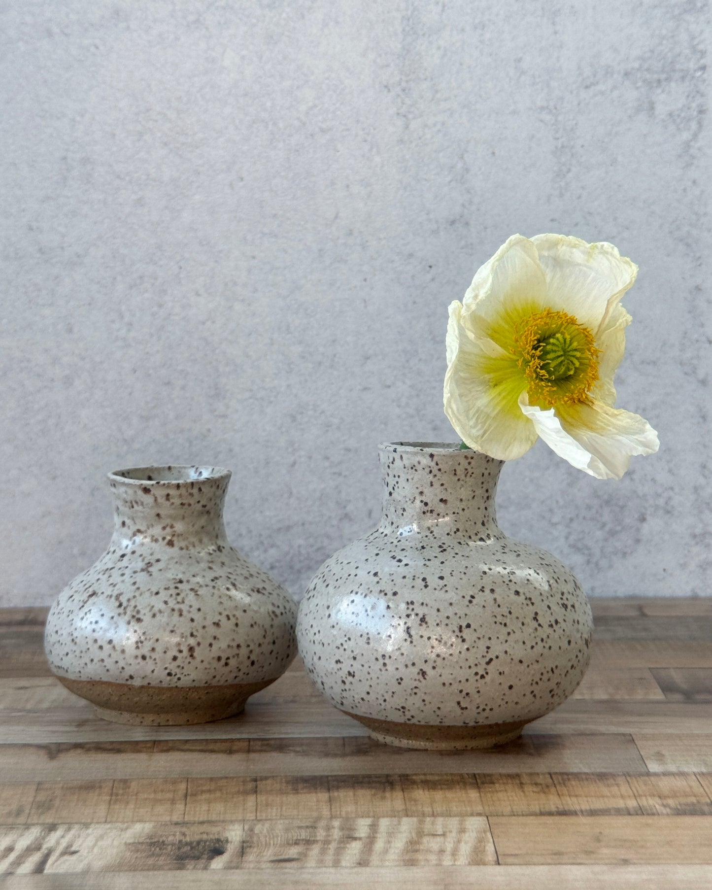 small speckled bud vase