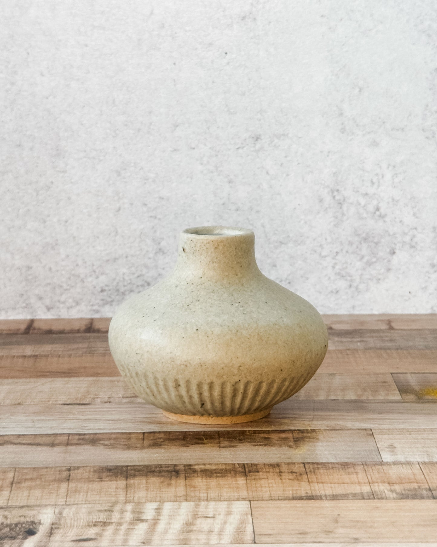 small carved bud vase