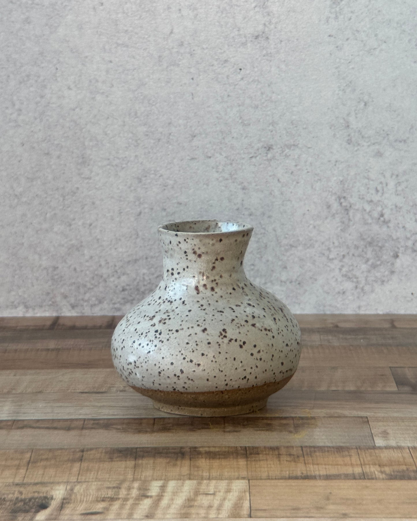 small speckled bud vase